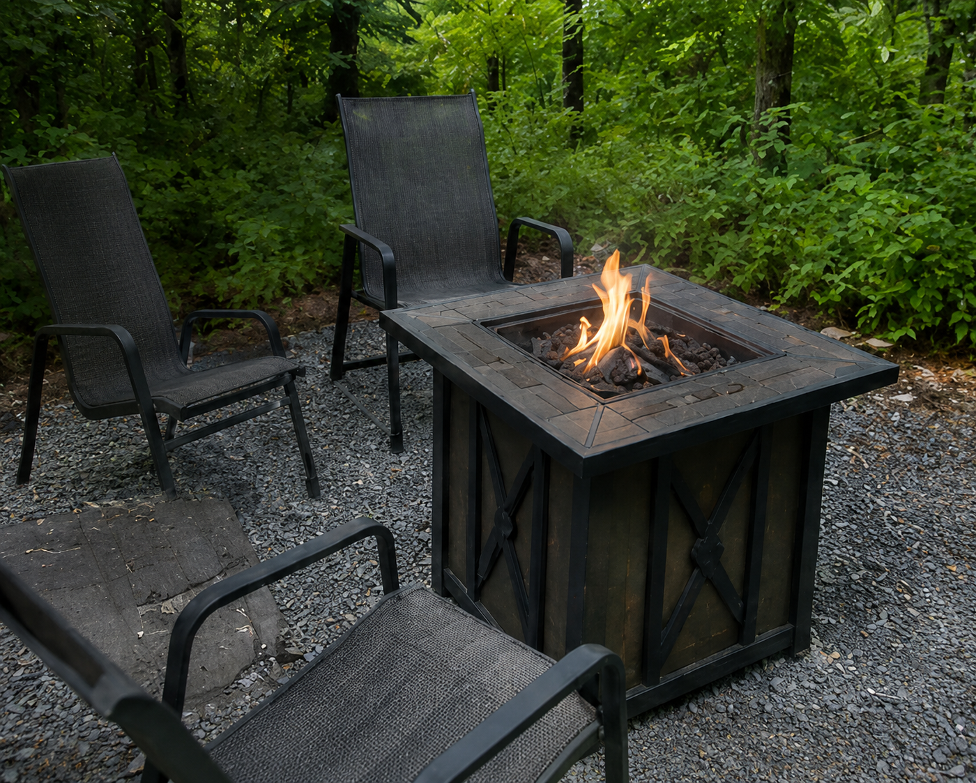 Dining table and chairs inside Ozark Canvas Camp